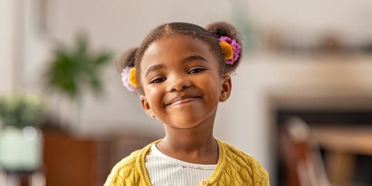 young girl smiling at camera