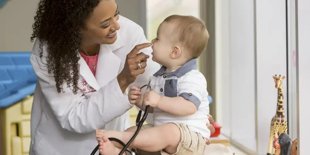 Provider Smiling at Child