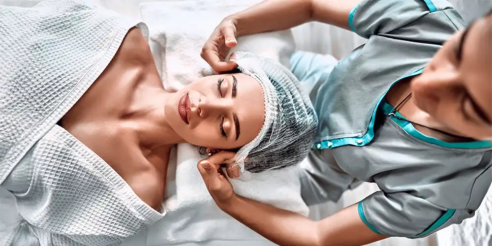 woman preparing for aesthetic treatment