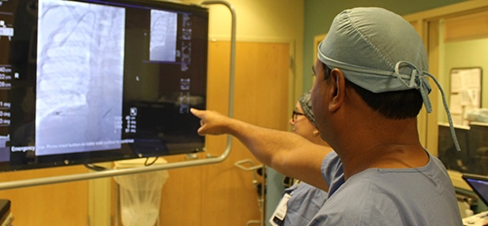 RadPartners radiologists examine an X-ray.