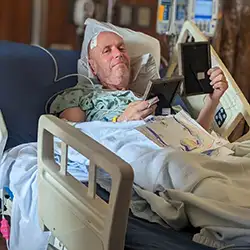 beeman looking at family photos