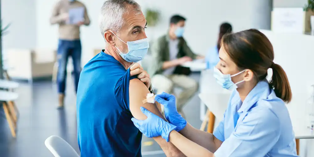 Man receiving a vaccine