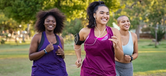 group of women walking and running