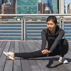 young woman stretching