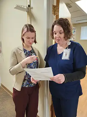resident conferring with another doctor