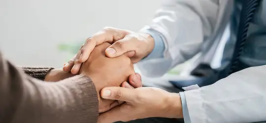 doctor holding hands