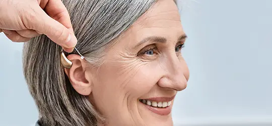 woman with hearing aid