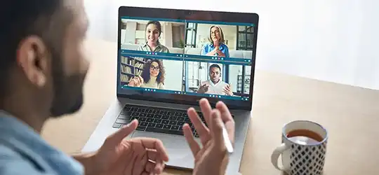 man meeting with council members