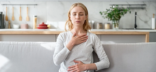 woman practicing deep breathing