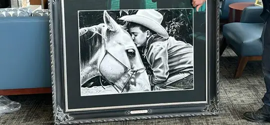 andy mast pencil drawing of boy kissing horse