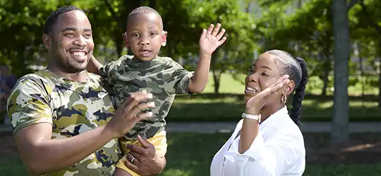 Terrence, Bianca, and TJ Williams in a park