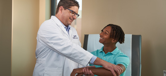 Provider Examining Patient