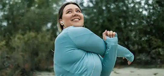 woman stretching before jogging