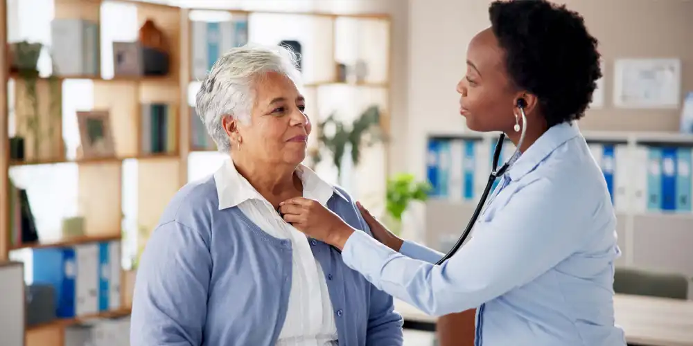 Cardiologist with patient