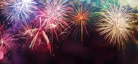 Fireworks in night sky.