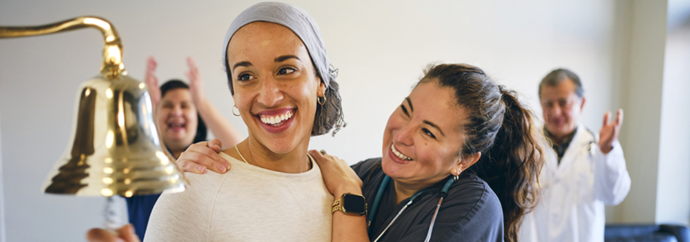 woman ringing a bell
