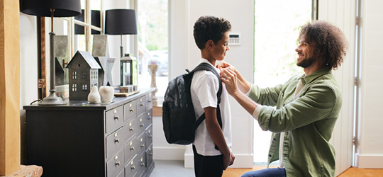 parent getting kid ready for school