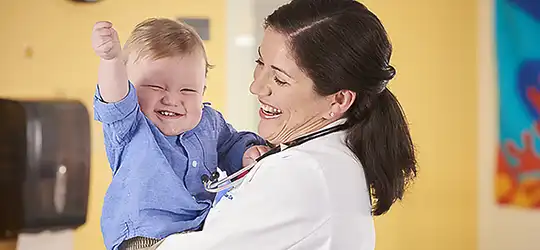 Jack cheering in provider's arms