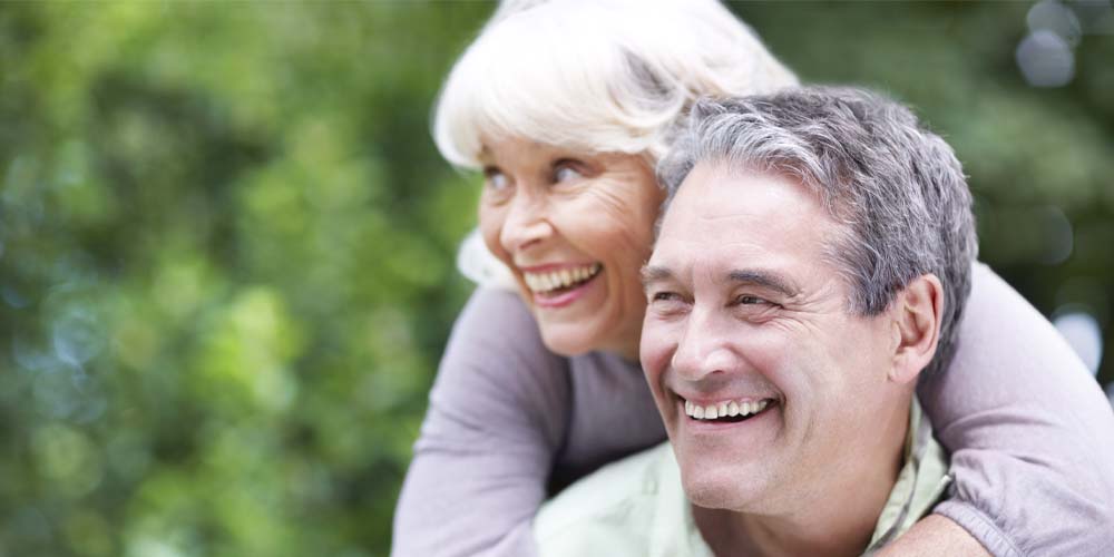 man completing an e-visit on his laptop
