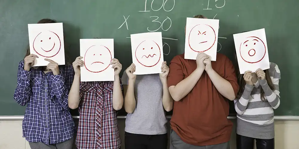children displaying different emotional faces