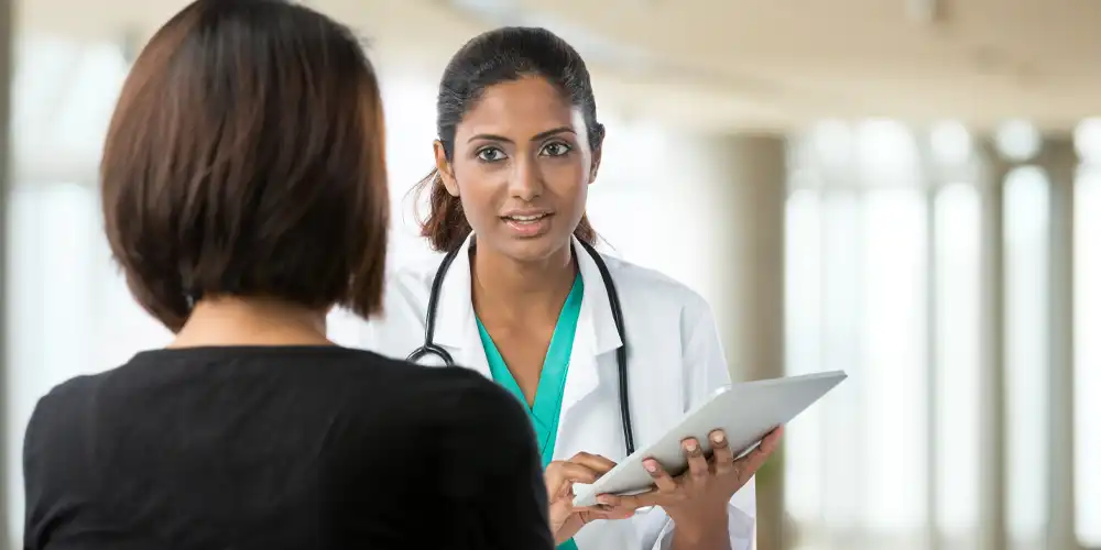 Provider speaking with patient