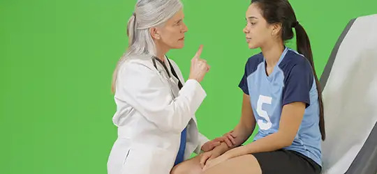 female testing doctor about getting a concussion