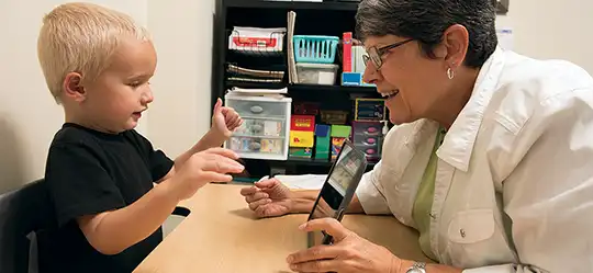 Little boy and provider at Knights of Columbus