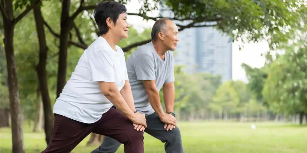 couple stretching outdoors