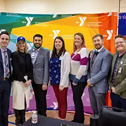 people celebrating ymca