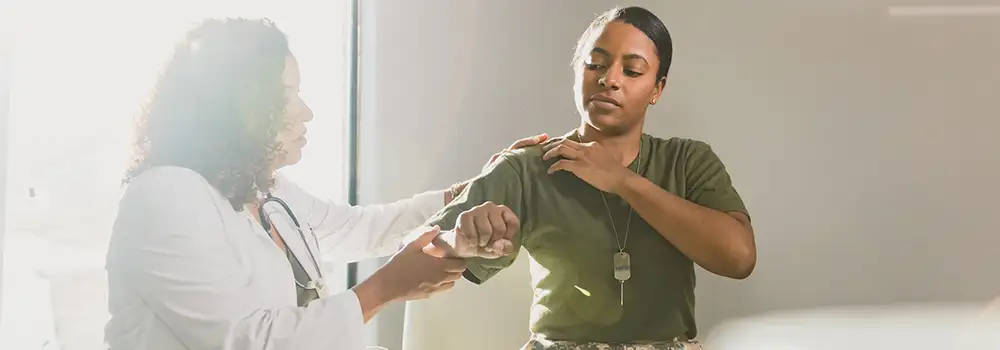 provider speaking to patient about shoulder