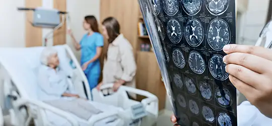 doctor reviewing patient scans after stroke