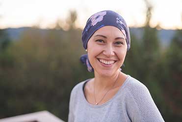 Woman with cancer sitting with daughter
