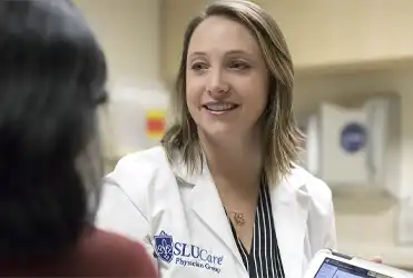 Dr. Lindsay Lombardo consults with patient