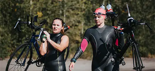 women competing in a triathlon