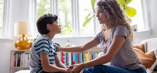 Woman speaking with child