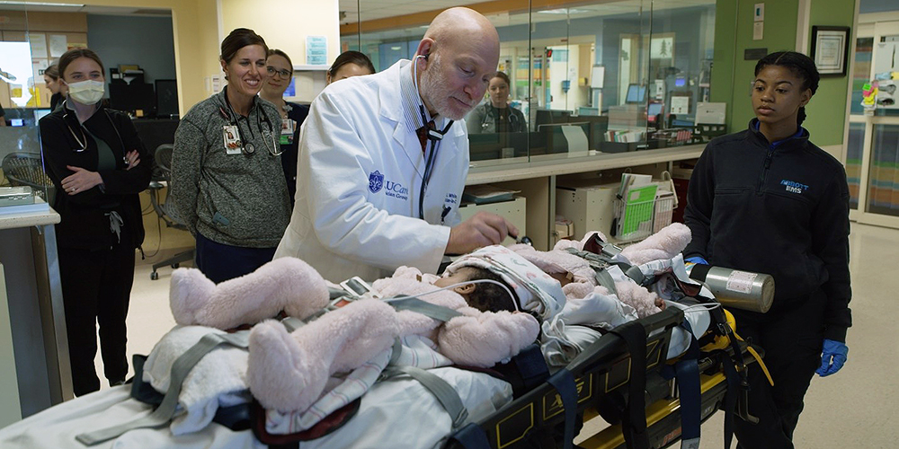 2-andrew-white-md-examining-twins