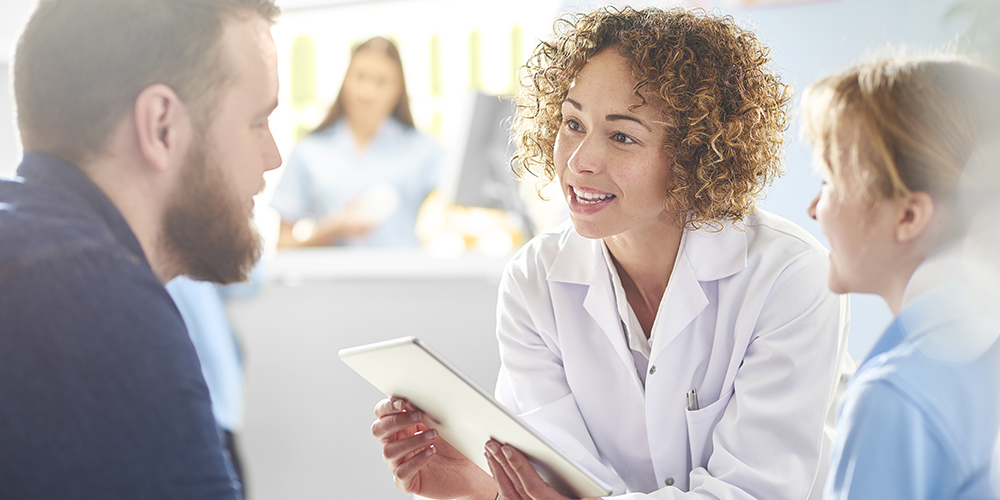 physician talking to patients