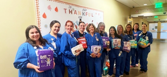 ssm health good samaritan staff holds diapers from drive