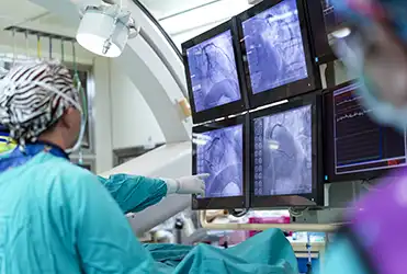 doctors in the cardiac cath lab