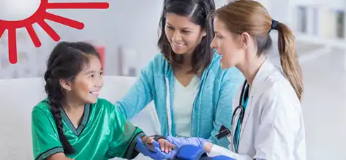 Cardinal Glennon provider looking at soccer player's broken arm