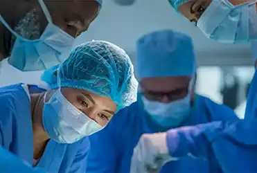surgeons performing a transplant