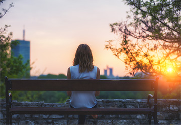 Woman sitting on bench