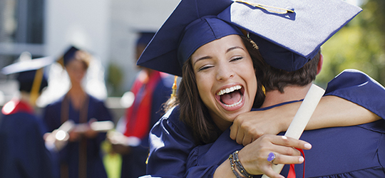 smiling student at graduation