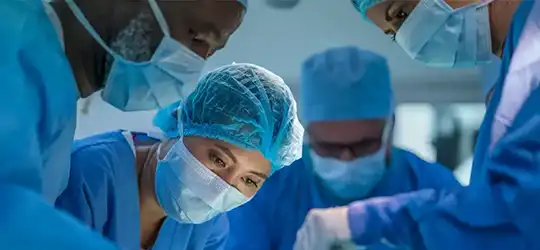 surgeons preforming surgical procedure