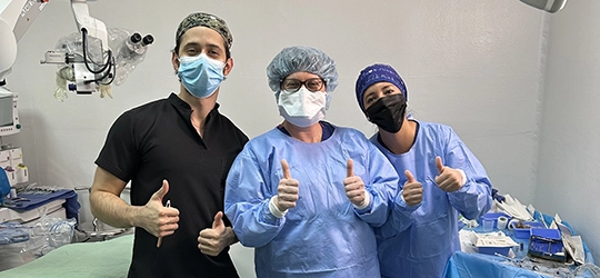 dr. julia aprov and staff giving heads up in honduras