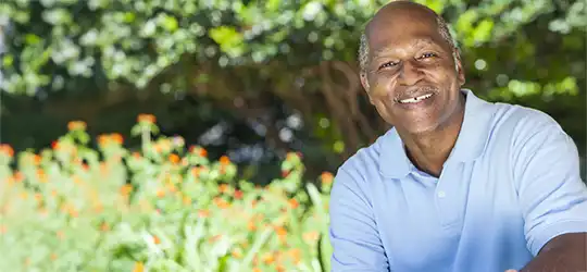 senior man smiling at camera
