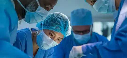 surgeons performing a surgical procedure