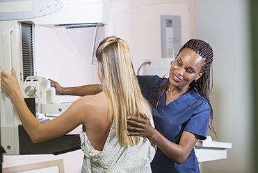 Woman having mammogram