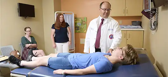 Dr. Teckman treating pediatric ATT patients at Cardinal Glennon Children's Hospital